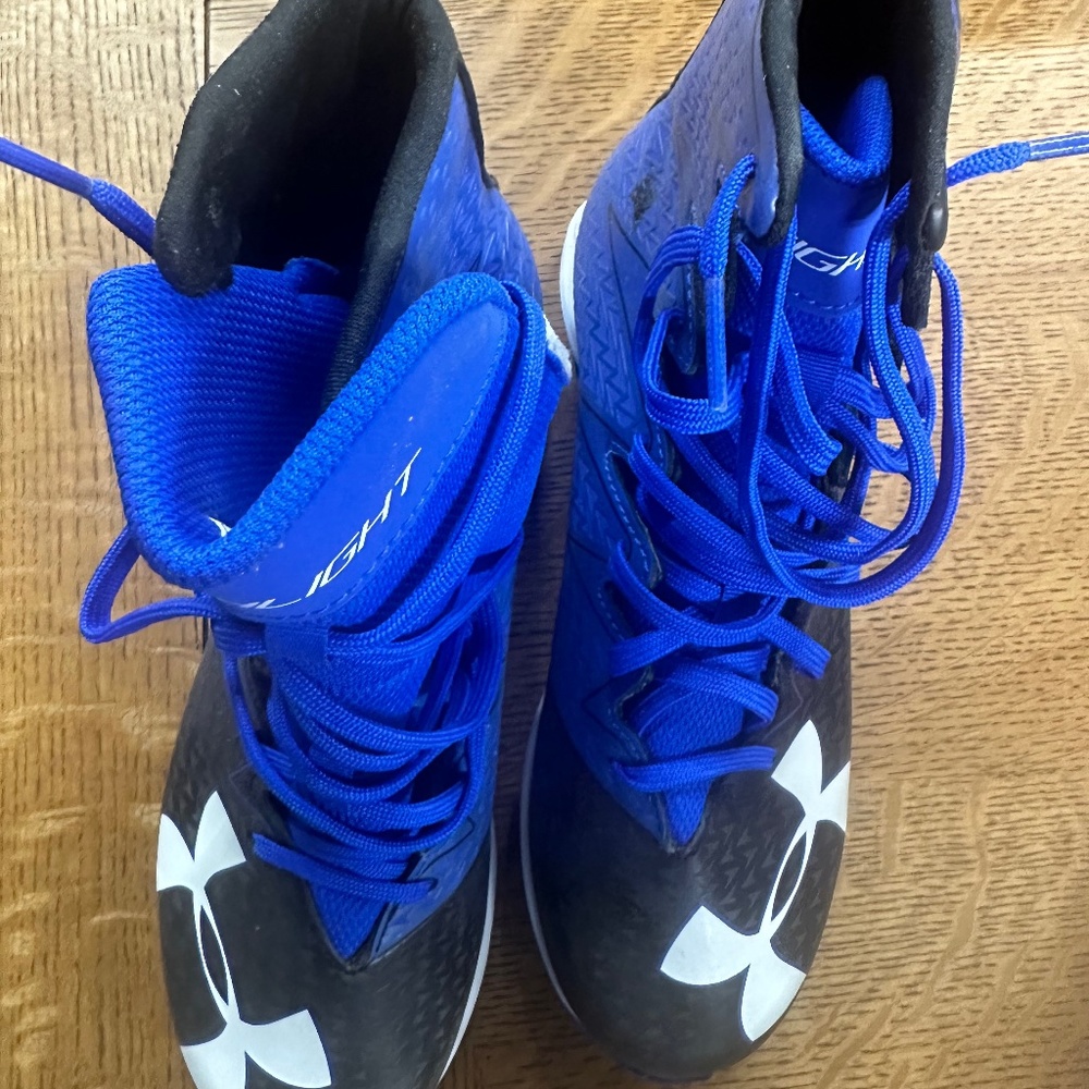 Under Armour Blue,  black, and white ClutchFit Cleats